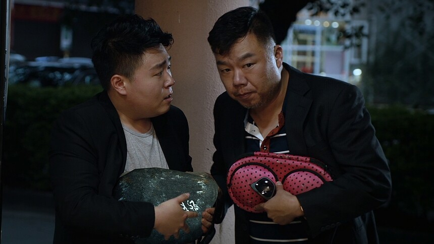 叔侄两买石藏