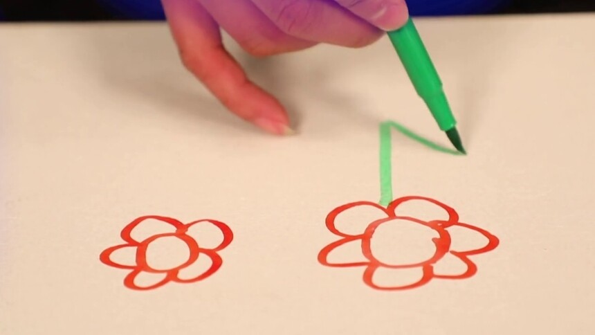 吹风机去彩笔渍的原理是什么？